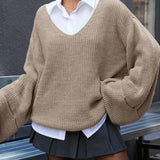 Blusa vintage de punto partido con cuello en V