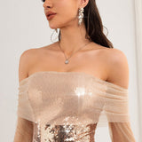 Vestido de noche con lentejuelas y malla y hombros descubiertos