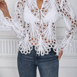 Nina - La blusa transparente moderna