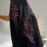 Sudadera vintage con estampado rosa descolorido