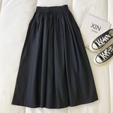 Falda midi de mujer – Cintura alta – Corte holgado y fluido – Tejido transpirable – Cintura elástica