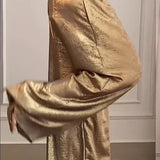 Conjunto de dos piezas para mujer: Top de punto holgado y pantalón ancho de satén.