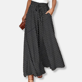 Pantalón ancho de mujer – Corte holgado – Tejido transpirable – Cintura con cordón – Bolsillos laterales