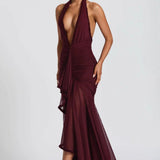 Vestido de noche sexy de sirena con escote pronunciado y espalda abierta.
