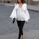 Blusa vintage con cuello bebé plisado y mangas abullonadas