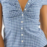 Blusa a cuadros de manga corta y botones