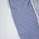 Conjunto de minifalda y top corto con lunares de encaje