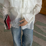 Blusa de gasa de tencel con mangas acampanadas y volantes