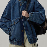 Chaqueta utilitaria en denim lavado con cuello alto