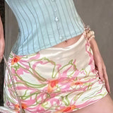 Conjunto: falda ajustada con estampado de bloques de color, top sin espalda y falda sin espalda