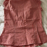 Blusa versátil a cuadros rojos y blancos
