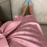 Falda drapeada de talle alto en satén con estampado floral