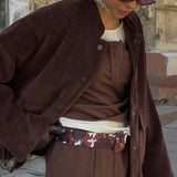 Chaqueta con cuello alto y botones de un solo pecho