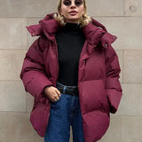 Chaqueta acolchada para mujer – Corte oversize – Repelente al agua – Capucha con cierre a presión – Largo medio