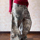 Vaqueros estilo hip hop de pierna ancha con lavado camuflaje.