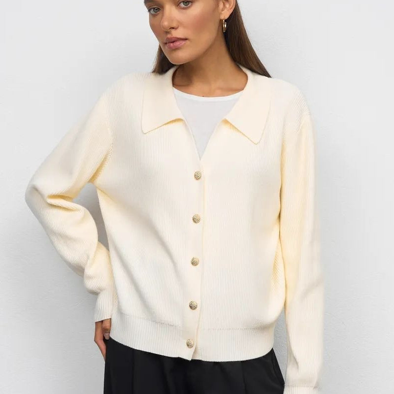Chaleco liso con cuello en V y botones
