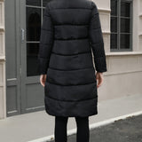 Chaqueta acolchada larga con capucha de talla grande