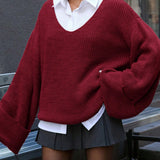 Blusa vintage de punto partido con cuello en V