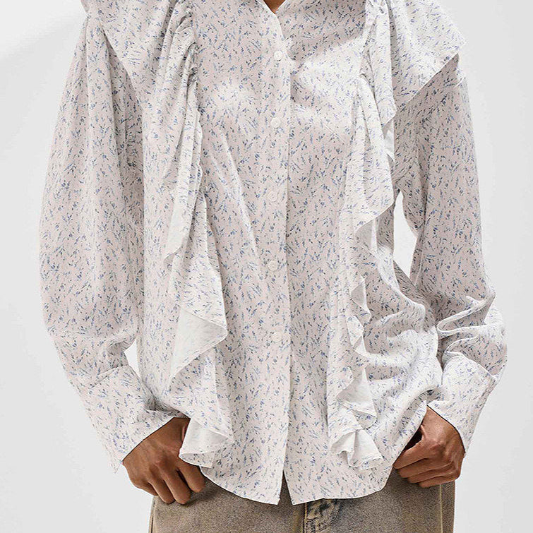 Blusa holgada con estampado floral y volantes