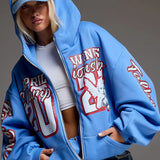 Sudadera con capucha y cremallera con estampado grueso