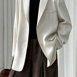 Blazer con espalda abierta y corte relajado