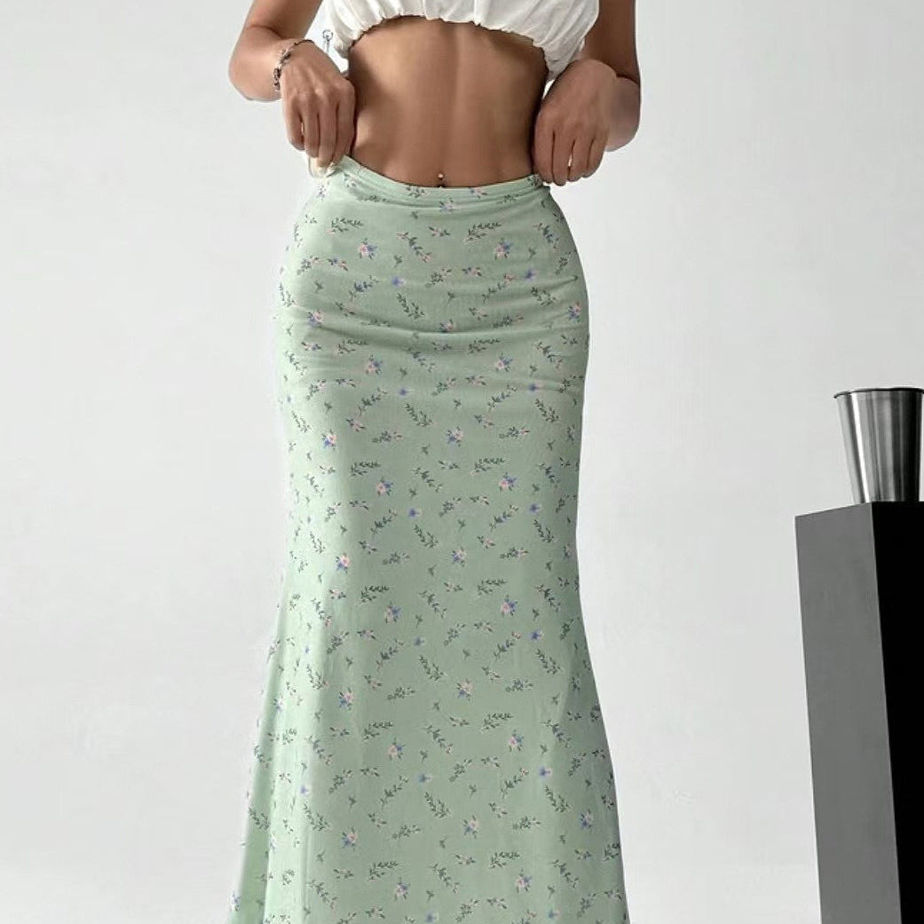 Falda midi trapecio de satén floral