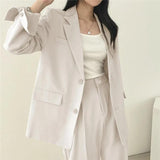 Blazer elegante y pantalón recto para mujer - Estilo refinado y cómodo