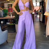 Conjunto de mujer: Top asimétrico de tirantes y pantalón de cintura alta y ancha
