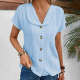 Blusa de mujer – Corte holgado – Textura arrugada – Mangas cortas – Botones llamativos