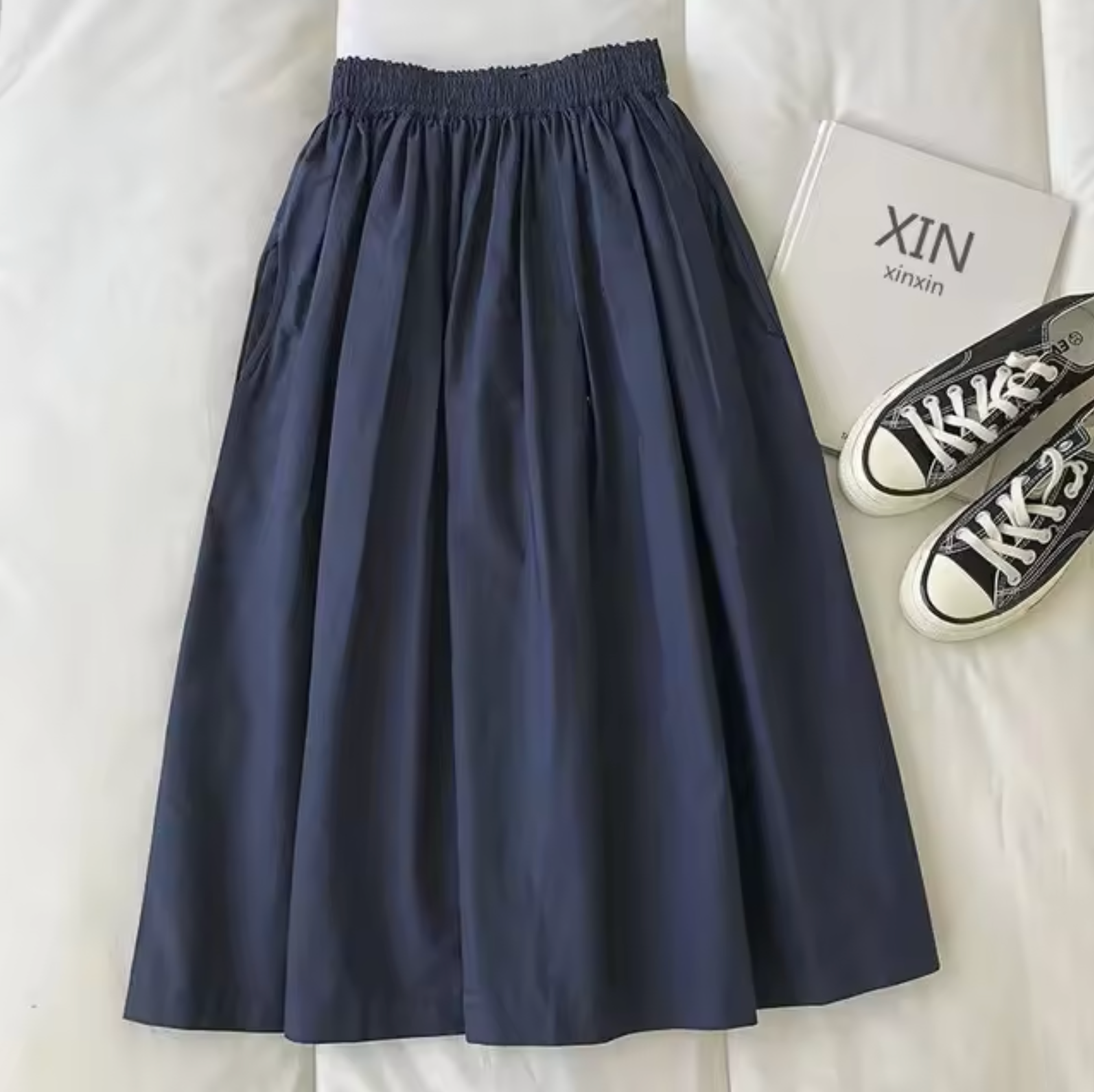 Falda midi de mujer – Cintura alta – Corte holgado y fluido – Tejido transpirable – Cintura elástica