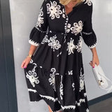 Katia - Vestido de diseñador con estampado floral y mangas 3/4