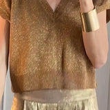 Conjunto de dos piezas para mujer: Top de punto holgado y pantalón ancho de satén.