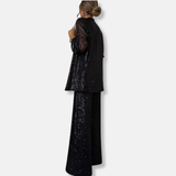 Conjunto de mujer: Chaqueta de lentejuelas estructurada y pantalones anchos de cintura alta.