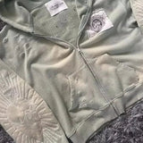 Sudadera con capucha y cremallera con letras bordadas