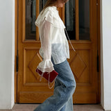 Blusa de gasa de tencel con mangas acampanadas y volantes