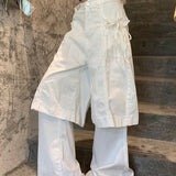 Pajarita, falso traje de dos piezas, vaqueros blancos holgados al estilo de los años 2000