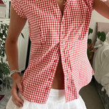 Blusa versátil a cuadros rojos y blancos