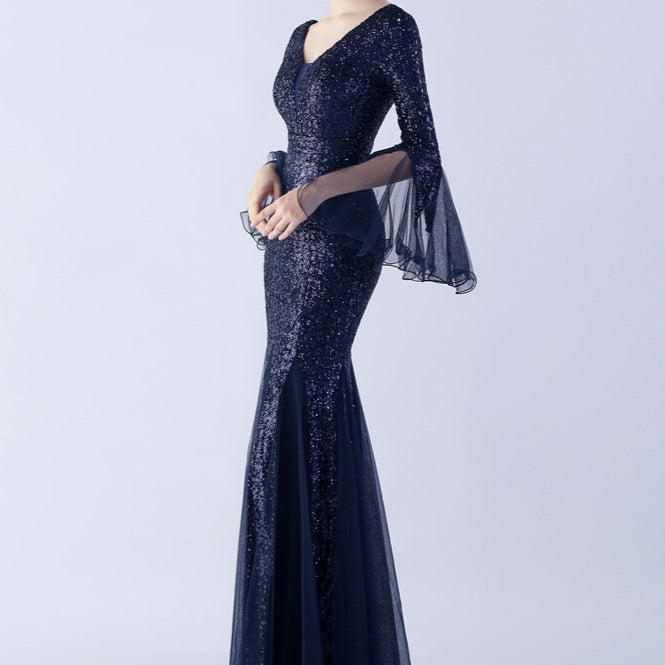 Vestido de noche con lentejuelas y volantes de tul