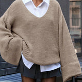 Blusa vintage de punto partido con cuello en V