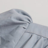 Chaqueta casual con detalles plisados