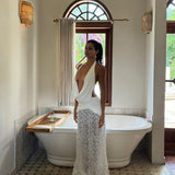 Vestido largo fruncido con espalda descubierta y estampado floral en 3D