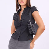 Blusa a cuadros de manga corta y botones