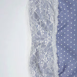 Conjunto de minifalda y top corto con lunares de encaje