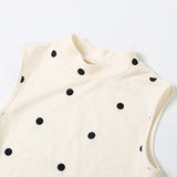 Vestido mini de lunares, cuello redondo, cintura ajustada, color block y pajarita