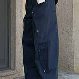 Pantalones cargo de pierna ancha con cintura baja y abertura con tachuelas