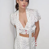 Conjunto maxi de dos piezas con lunares y escote en pico