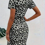 Vestido de mujer - Entallado - Mangas cortas - Escote en forma de lágrima - Detalles de malla - Largo hasta la rodilla
