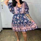 Vestido de mujer - Estampado floral - Corte acampanado - Cuello en V - Mangas cortas con volantes