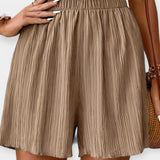 Pantalones cortos elegantes con plisado