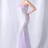 Vestido de noche con lentejuelas y plumas de avestruz